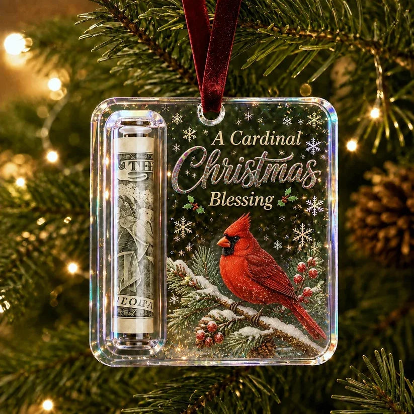 Christmas cash gift ornament hanging on a Christmas tree